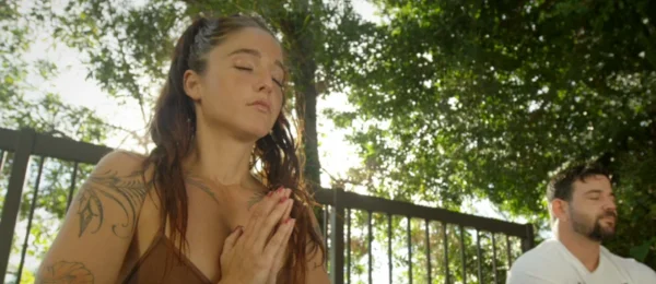 woman-and-man-doing-yoga