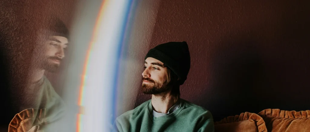 man-looking out the window