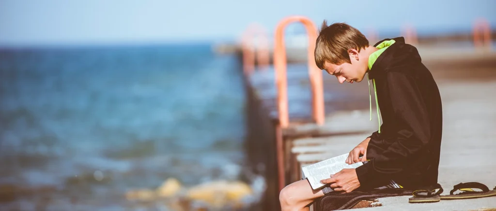 man looking at the sea
