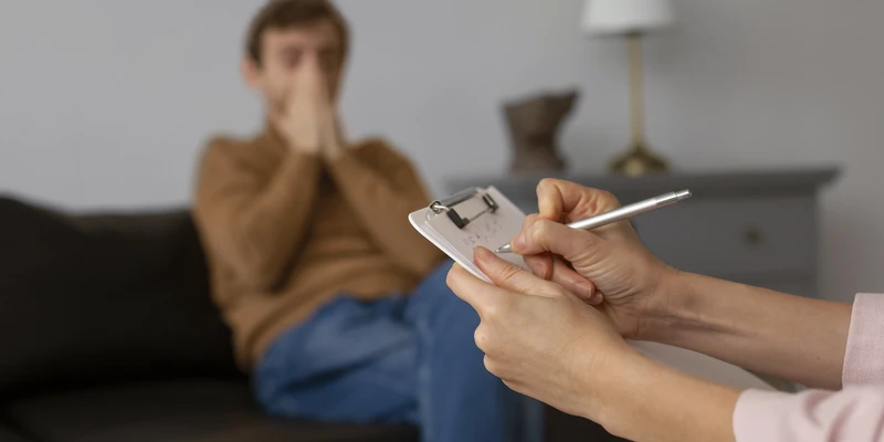 a man with sad emotions being displayed during therapy