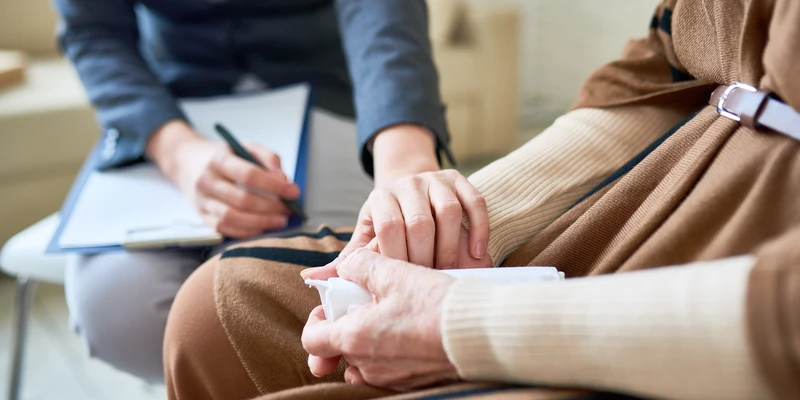 patient getting support from therapist