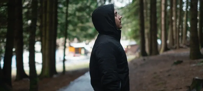 sad man thinking while outside